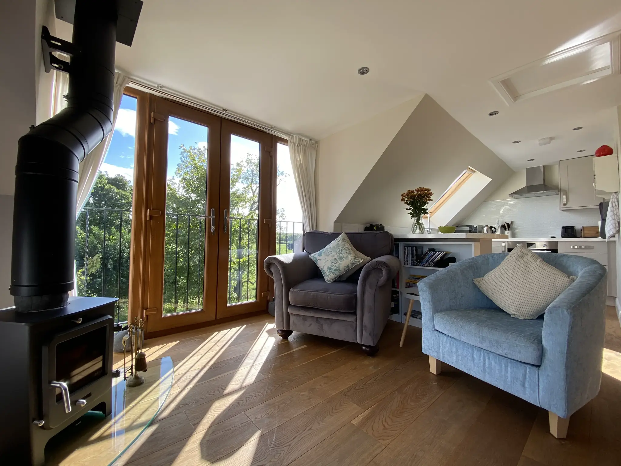 Close up picture of living room's fireplace and sofa